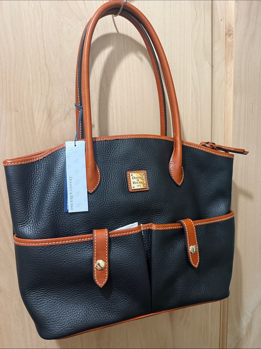 Dooney & Bourke Black Tote with Brown Trim and Handles